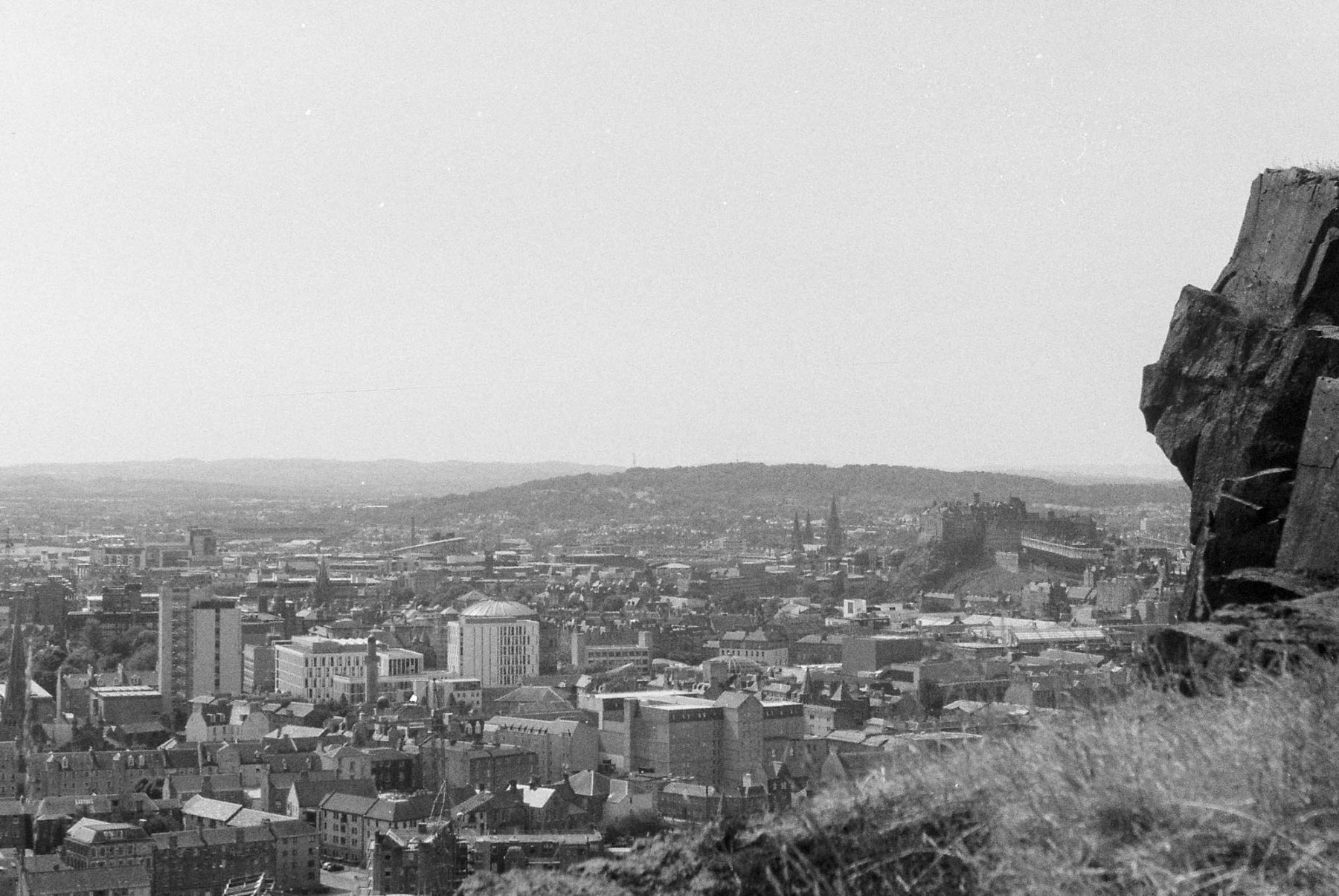 Edinburgh from Salisbury Craggs. View towards the castle across the University and Old Town.