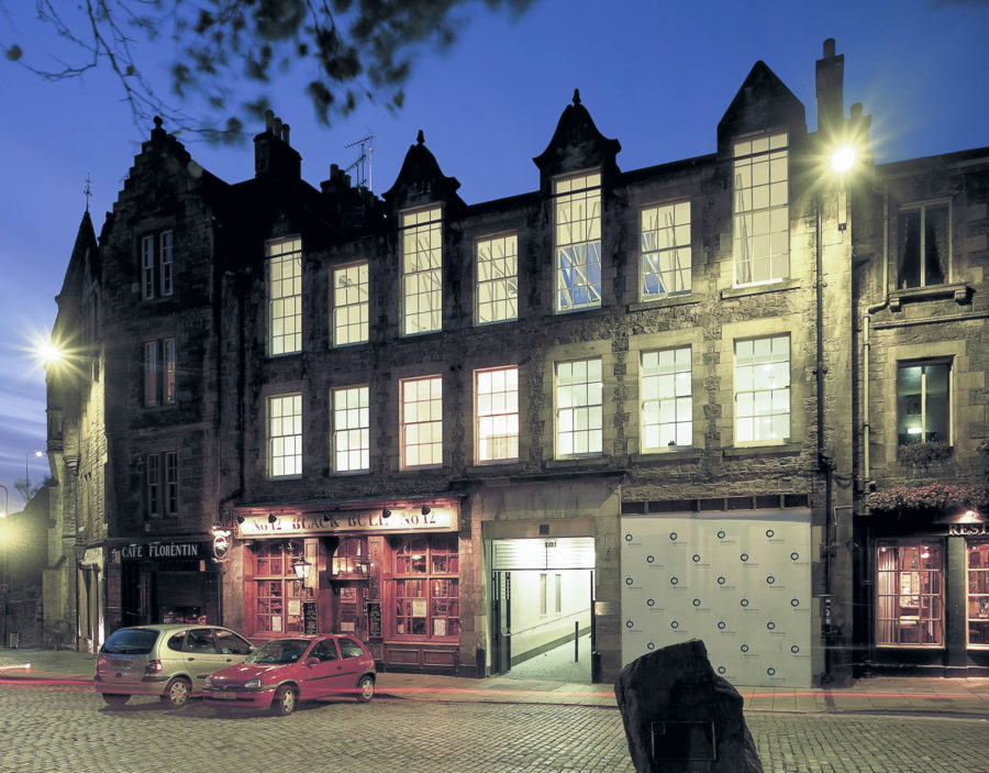 Dance Base Edinburgh, Entrance and facade in the Grassmarket.Shown at night. Malcolm Fraser Architects