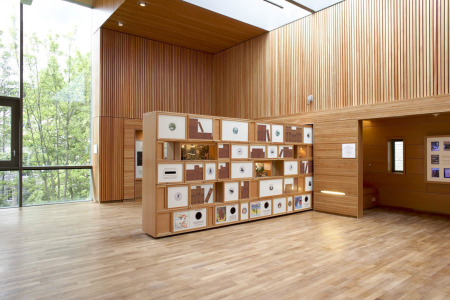 Interior of Scottish Story Telling Centre, Edinburgh. Wood panelled studio with pull-out divider/shelves in wood